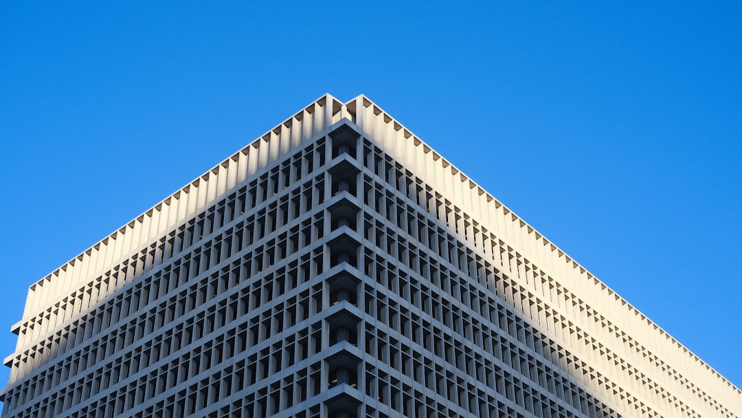 Modern office building against a clear blue sky